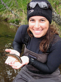Bianca holding fish in Alaska