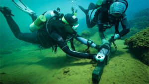 Divers working under the sea