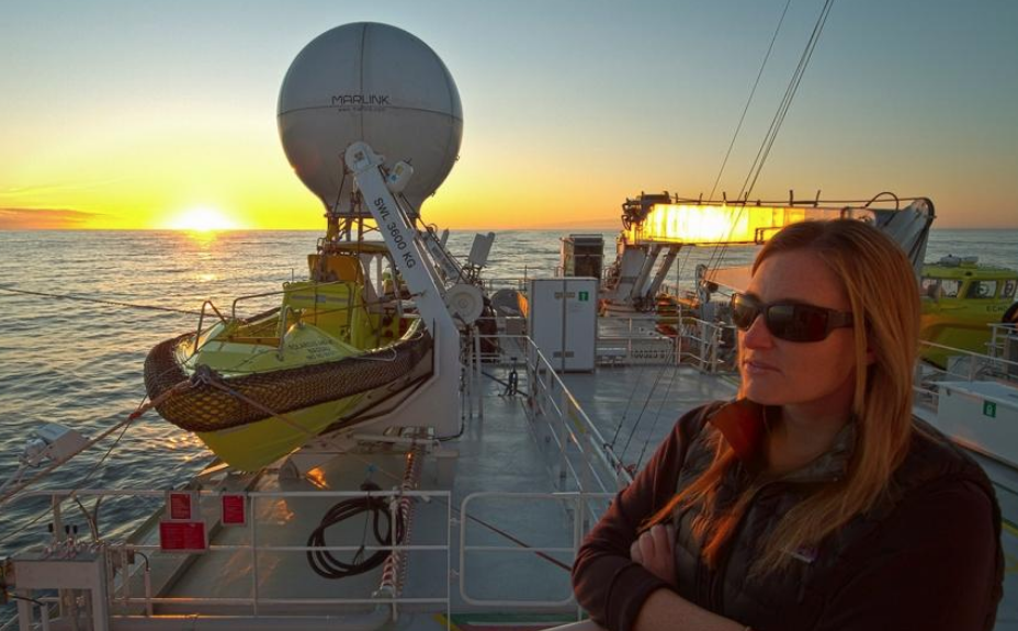 Heather on boat at sunset