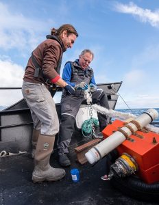 Manolo preparing to drop sensors in the water