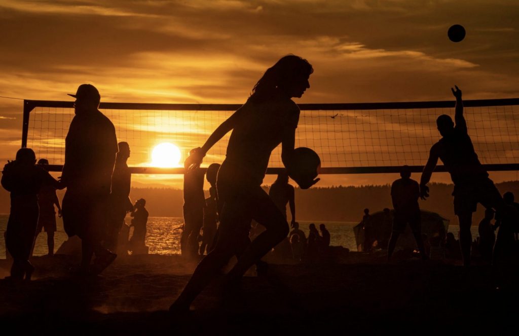 sunset volleyball playing