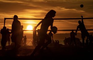 sunset volleyball playing