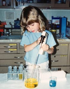 Hannah doing science as a youngster
