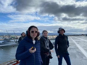 A small group of researchers on a cloudy day.