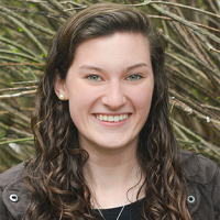 Headshot of Mary Margaret Stoll, a young woman with long brown hair.