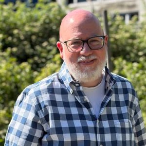Headshot of Fred Averick, outdoors on a sunny day