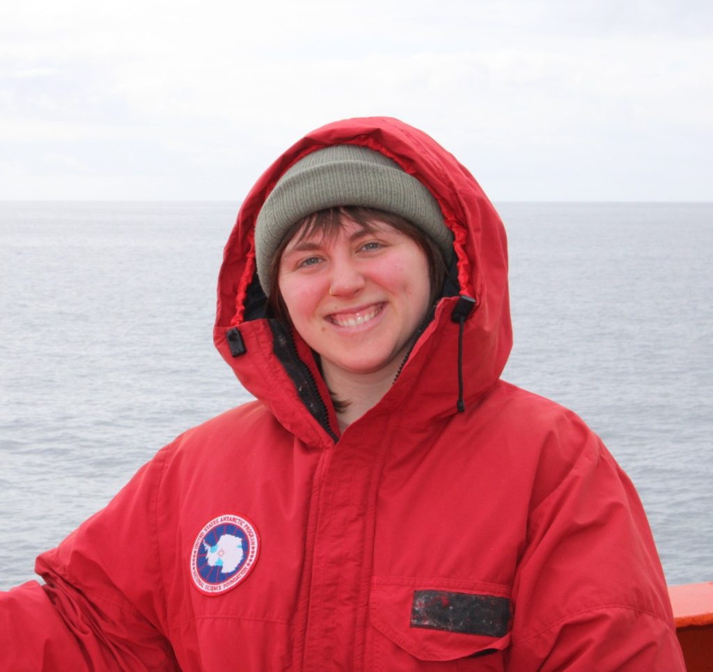 Headshot of Jess Davis, wearing Arctic outdoor gear.