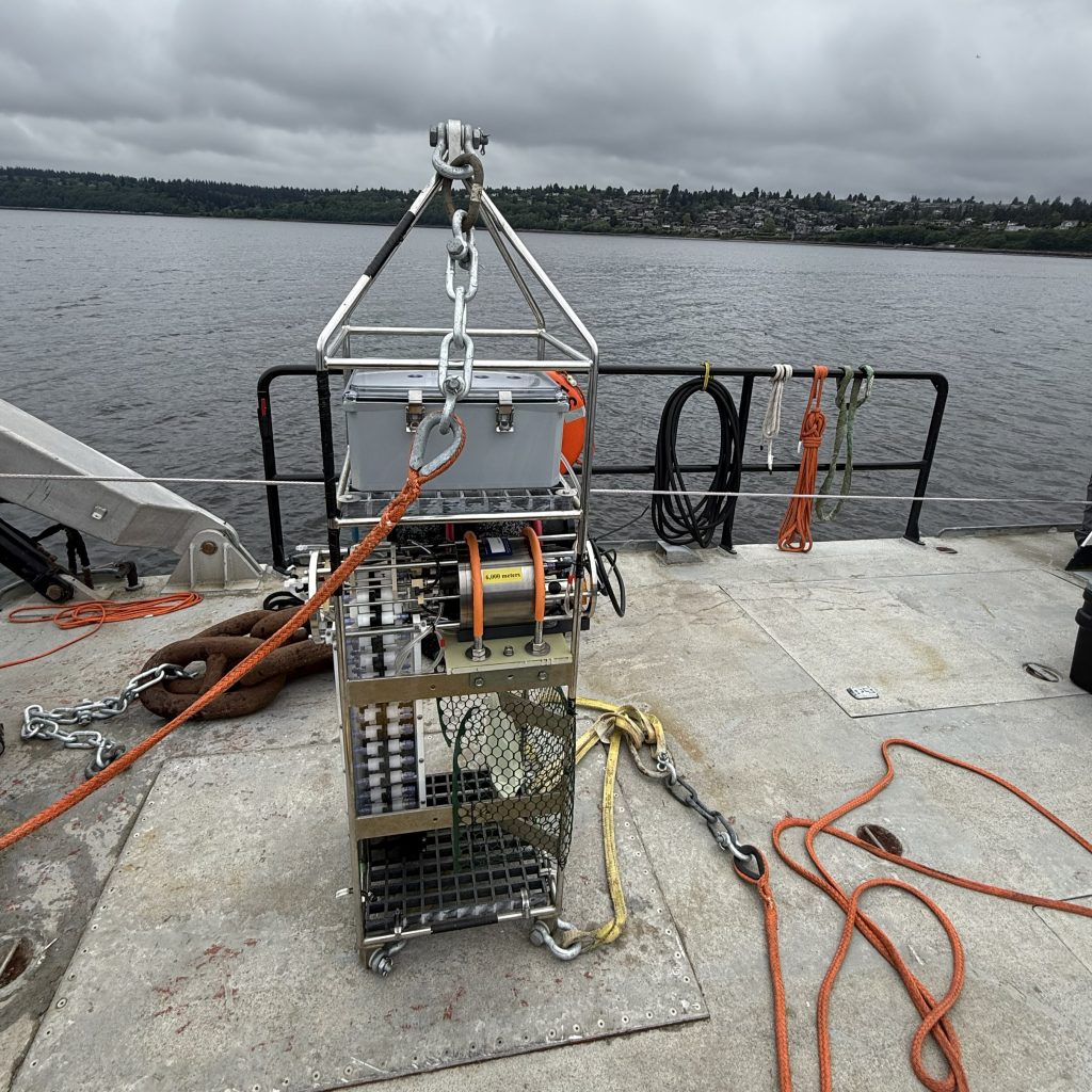 The RoCSI aboard the deck of a research ship, connected to a metal mooring.