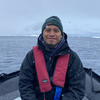 Carlos Hernandez Santiago on a boat in the Southern Ocean.